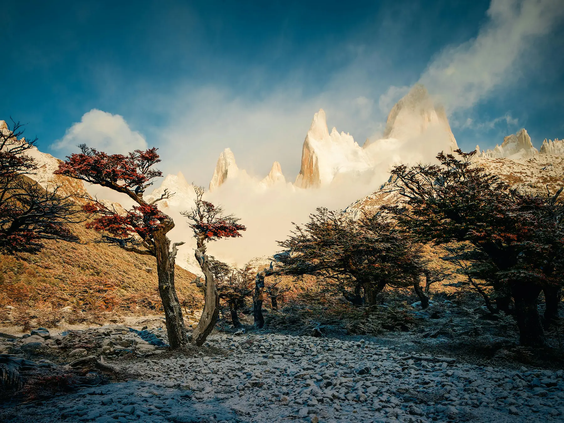 The Fitz Roy range silhouetted against a Patagonian sunset.