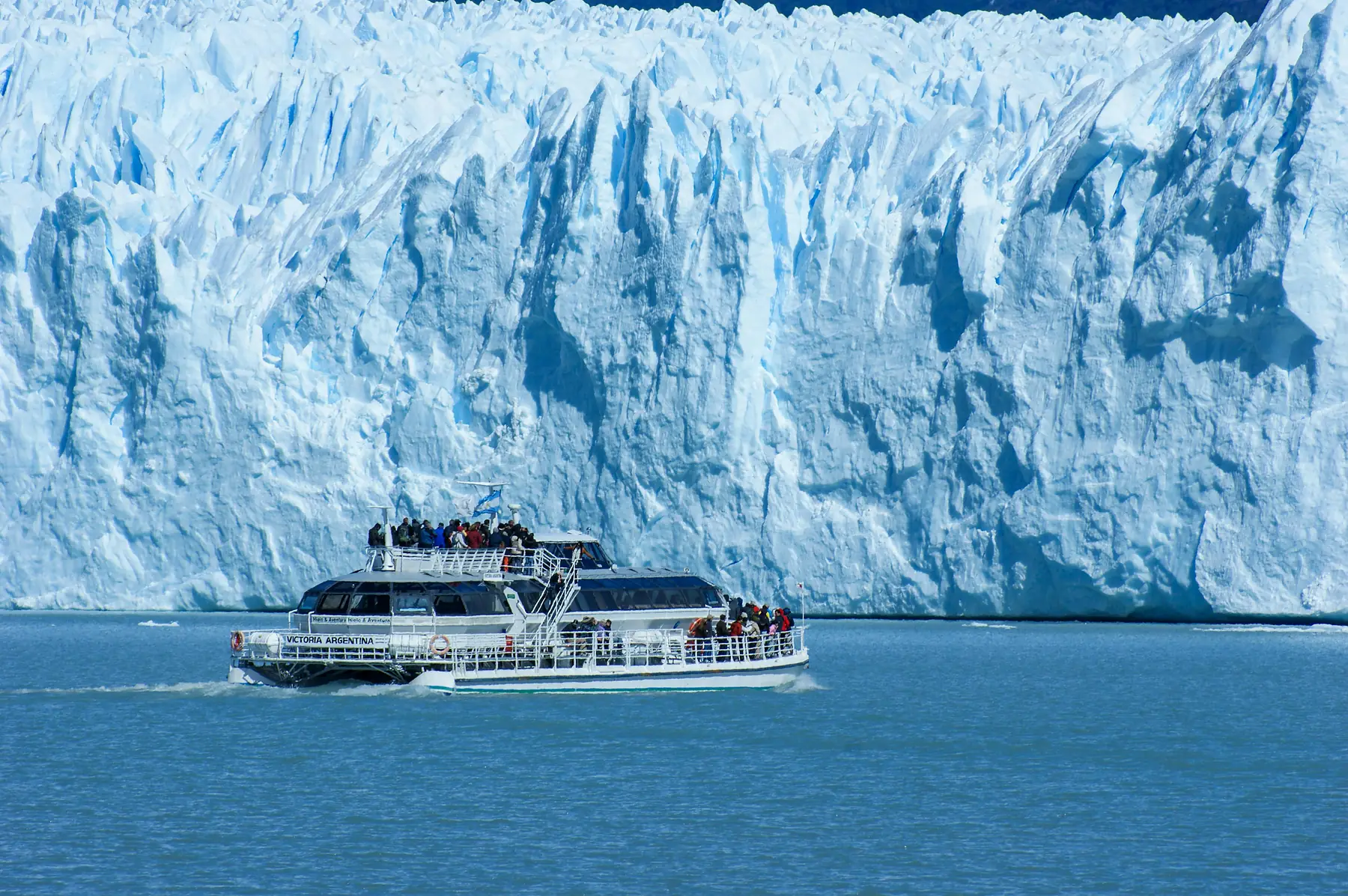Perito Moreno Glacier stretching across Brazo Rico from the viewing platforms.