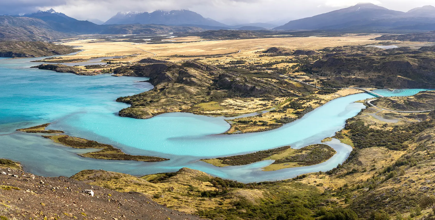 Trekker navigating the technical terrain of the Huemul Circuit