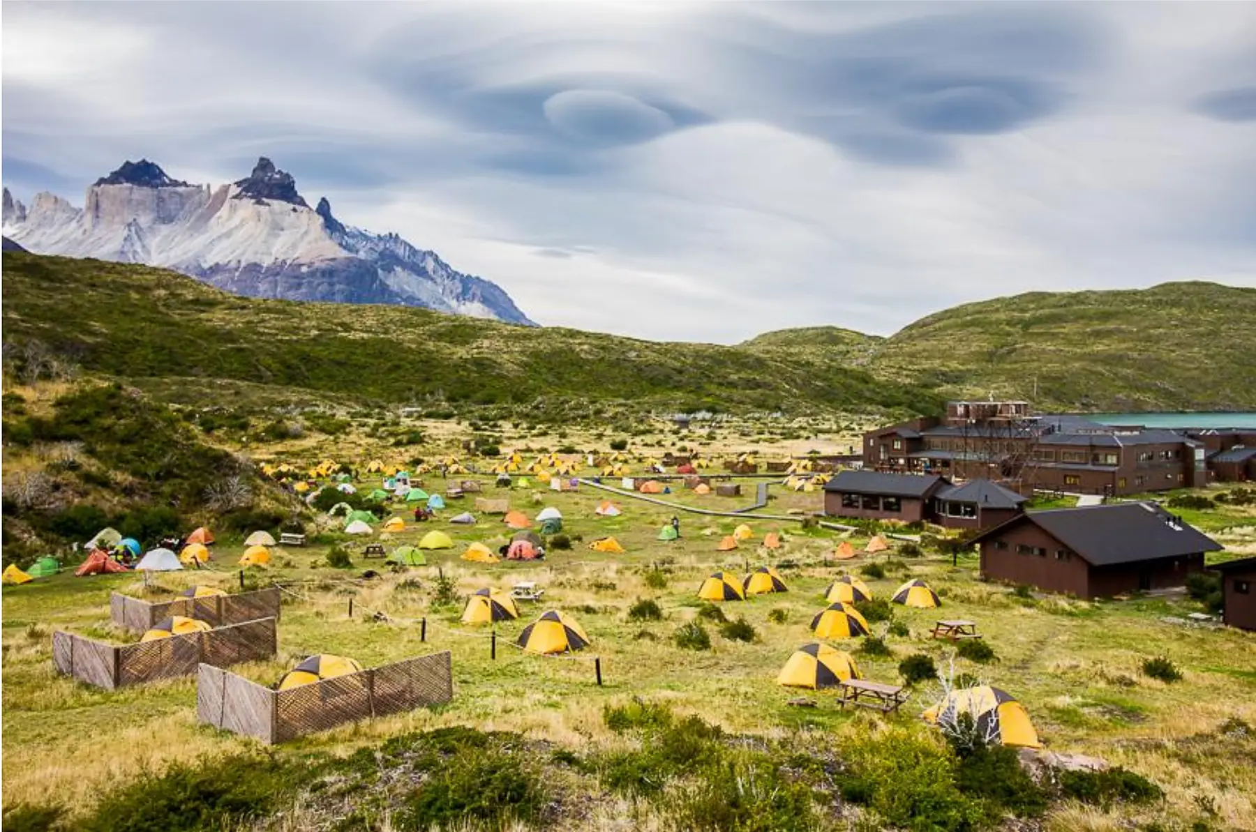 W Trek campsite and refugio buildings beneath the peaks of Torres del Paine